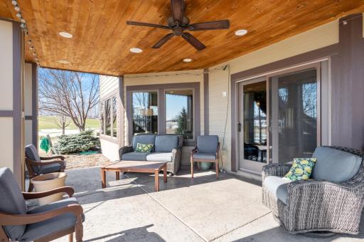 Photo for 7651 Cress View Lane, Prior Lake, MN 55372 - Listing #6352275 Walkout basement to the comfortable concrete patio with wood ceiling and recess lighting.