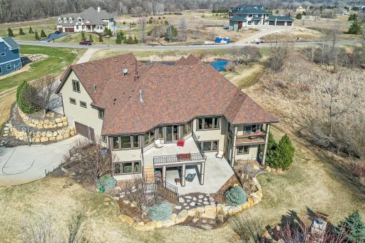 Photo for 7651 Cress View Lane, Prior Lake, MN 55372 - Listing #6352275 So many amenities from the deck, to the patio underneath that has recessed lighting and a fan. The sportcourt and enormous outdoor fireplace make this a dream come true.