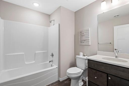 The 2nd bathroom has a 5' fiberglass tub/shower combination. High mount toilets are standard in all baths.