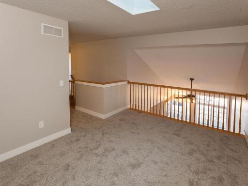 Spacious Loft overlooks main floor - perfect for in-home Office, Gaming area, Workout area