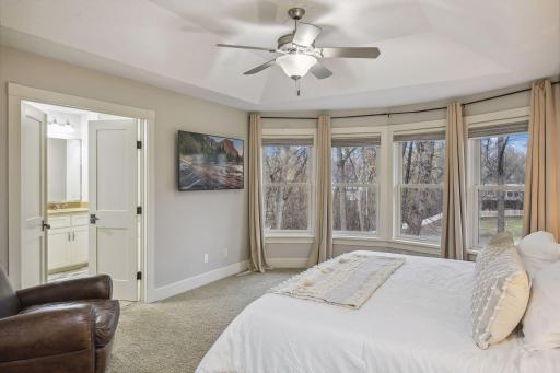 Primary Suite with Bay Windows, HD Blinds and lots of natural light