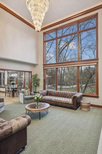Great Room with Large Windows overlooking the expansive Backyard