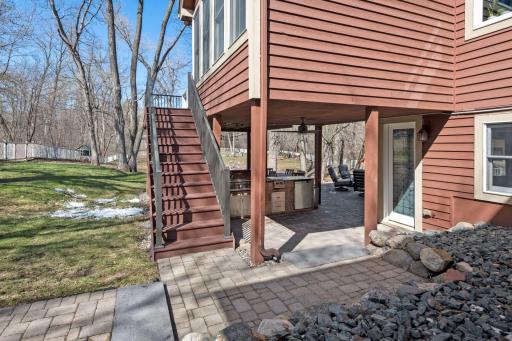Deck Stairway to Backyard and Outdoor Kitchen