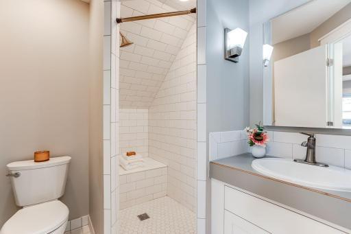 Photo for 3424 Utah Avenue N, Crystal, MN 55427 - Listing #6354239 In-Law 3/4 Bath with walk-in tile shower, tile floor, and full inlay vanity.