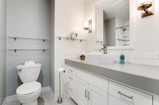 Photo for 3424 Utah Avenue N, Crystal, MN 55427 - Listing #6354239 Totally updated upper level Full Bath with tile floor and custom full inlay vanity cabinet.