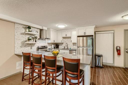 Entertain guests in this awesome party room on 1st floor! There is a full kitchen and it's available at no cost to residents.