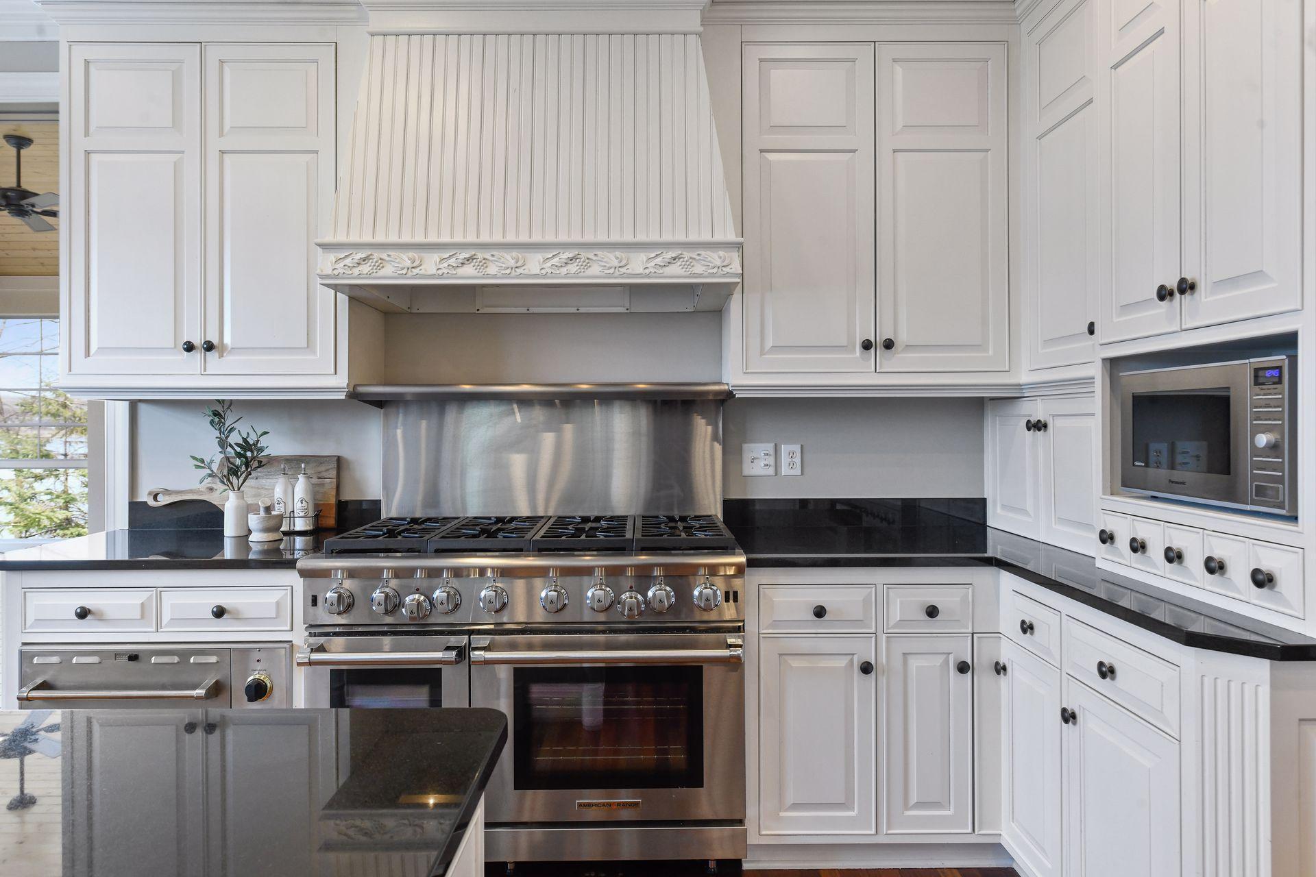 The chef in you will appreciate the high-end appliances, including this 8-burner gas range with dual ovens, warming drawer, and large SubZero refrigerator