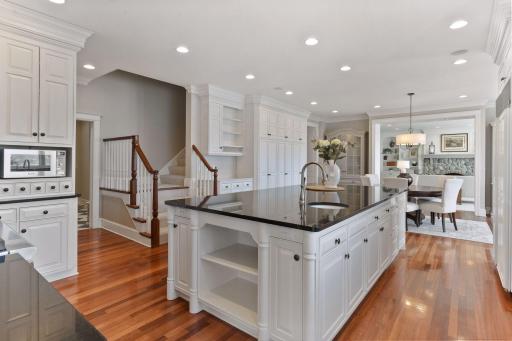 An informal dining area anchors the far end of the kitchen