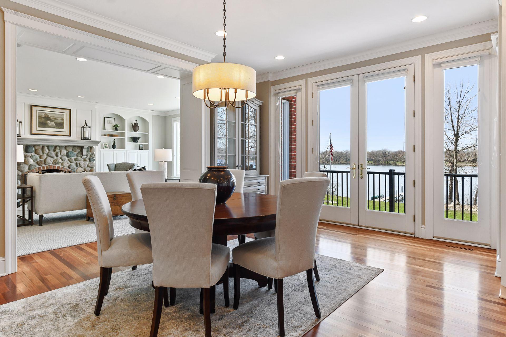 Informal dining with access to the upper balcony and view of the lake