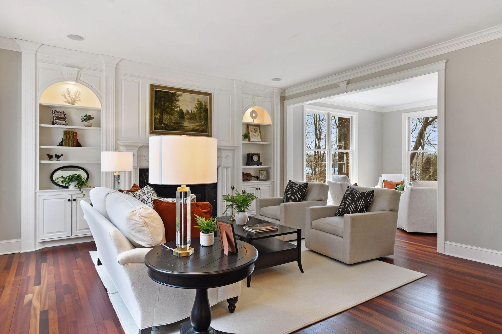 The formal living room provides a more intimate spot for quiet conversation in front of the fire