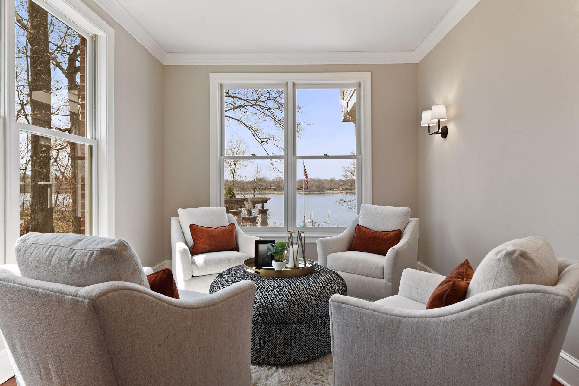 Just off the living room is a quiet space ideal for a readng nook, music room, or small home office space