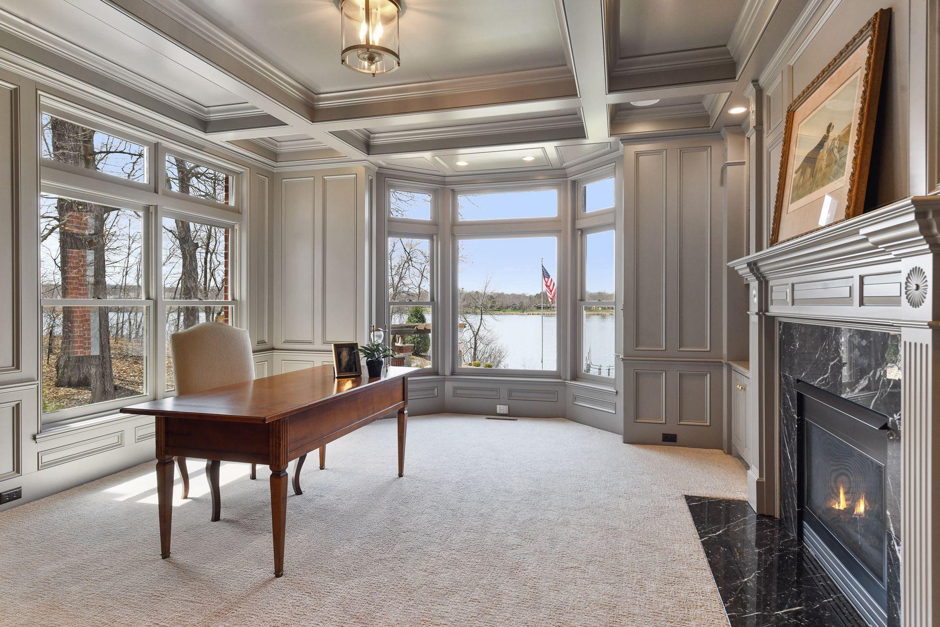 A very impressive home office space or library is located on the main level