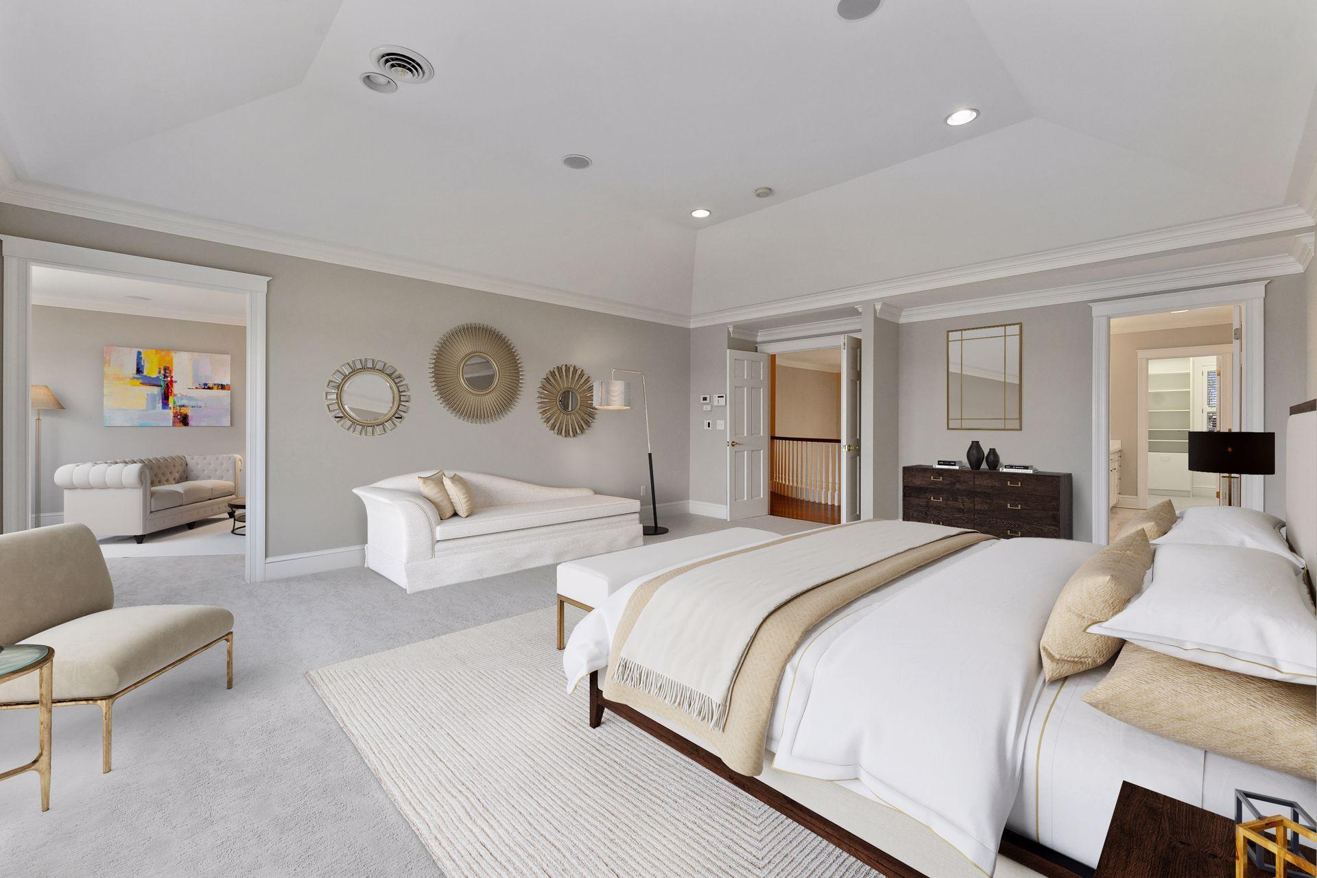 Tray ceiling with crown molding detail, expansive window with westerly lake views, spa-like bath, and a private sitting room are features of the well-appointed owner's suite