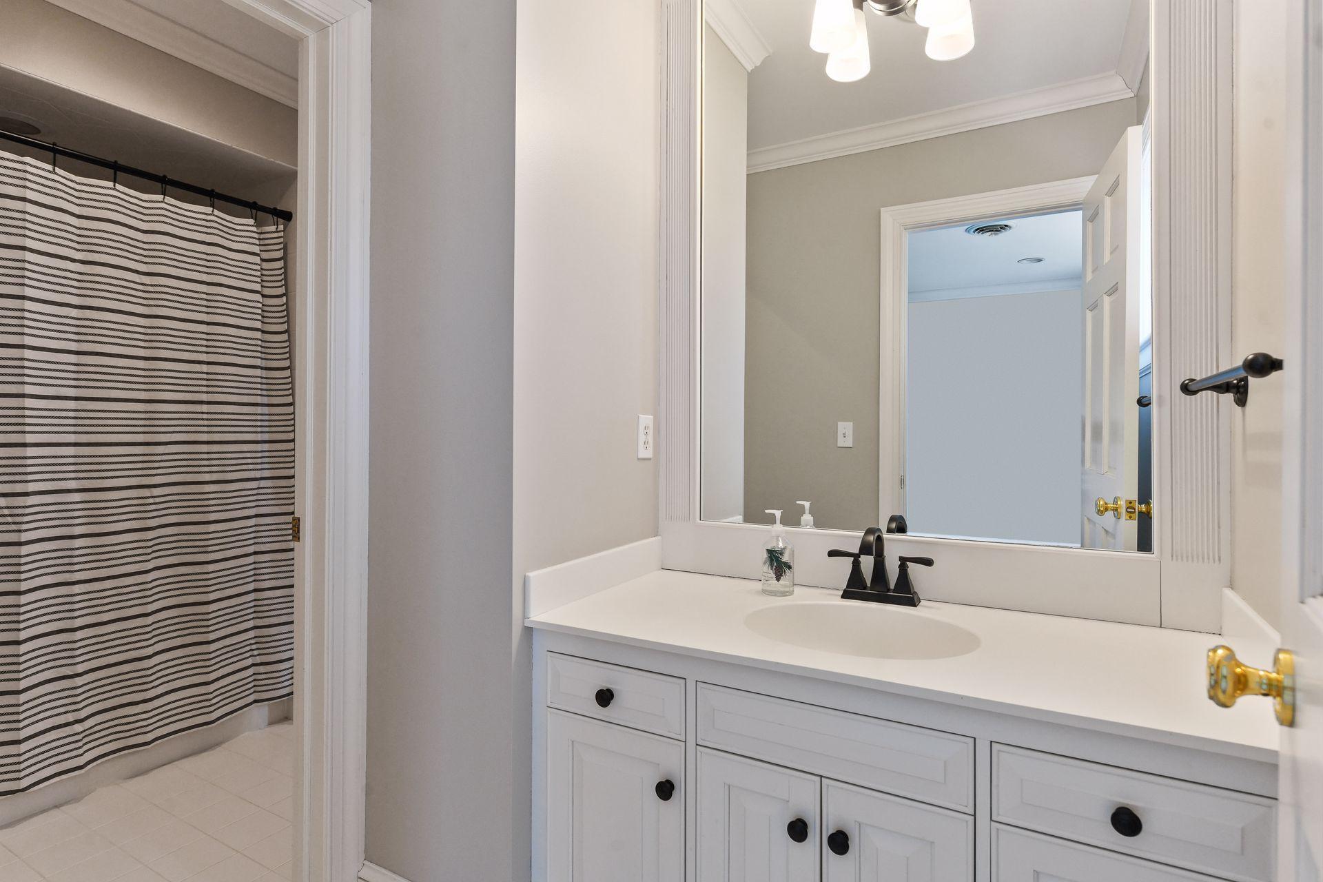 Each bedroom has a private vanity area with tub/shower connecting the two