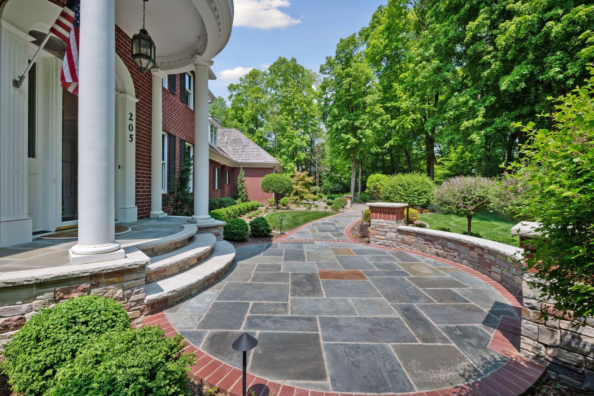 Pretty landscaping throughout this stunning property