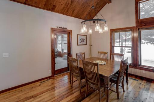 Dining area leads out to the lake side 3 season porch.