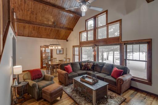 Inviting living room and dining area to enjoy lake views!