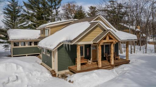 Exterior features LP Smart siding and one of a kind ~ 200 year-old hand-hewn beams!