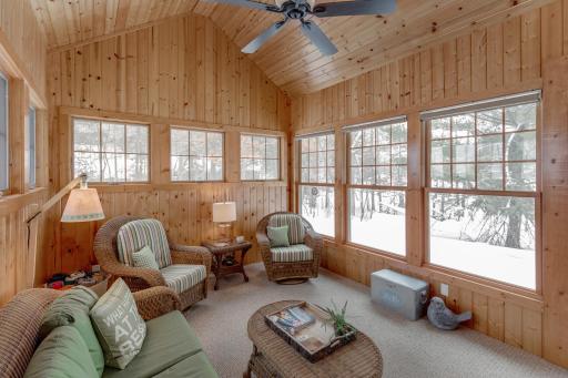 3 season porch is surrounded by windows to let the natural light shine in!