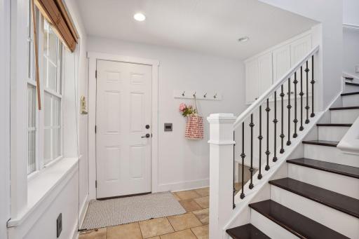 Stair lead up to 2 separate bedrooms with loft-like bonus room