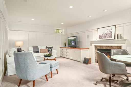 Lower level family room with wainscoting.