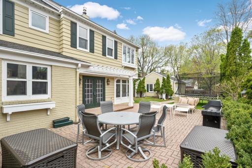Extra deep lot is almost 180ft deep and offers generous green space just past the paver patio.