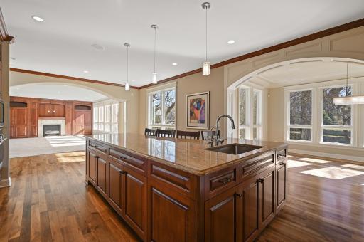 Plenty of space for living and entertaining in this home! 9-foot ceilings on the main level and oversized floor to ceiling windows that fill the space with natural light! Built-in surround sound throughout the home.