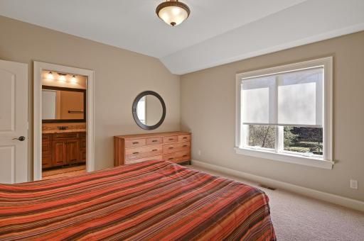 Upper level bedroom #4 with walk-through access to a full bathroom.