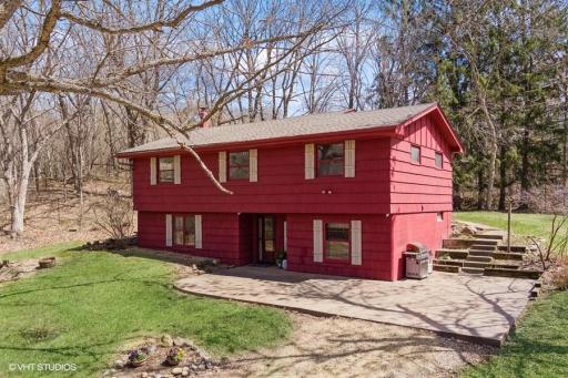 Take a peek at this wonderful wooded property! 4bed/2bath with garage and 1.3acres of privacy!