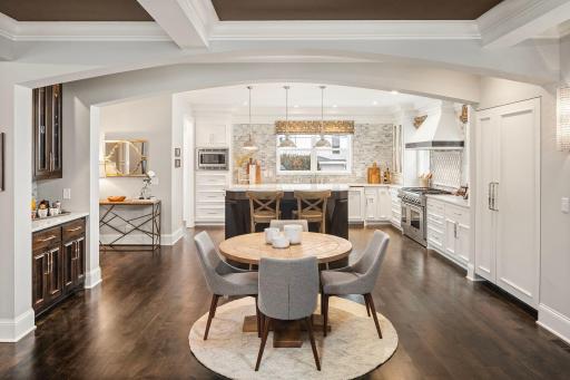 Exceptionally, well-appointed chefsâ kitchen with custom cabinetry, large walk-in pantry and pantry closet, high-end appliances, and intricate tile work showcases the homeâs ability to entertain and create comfortable places for daily living.