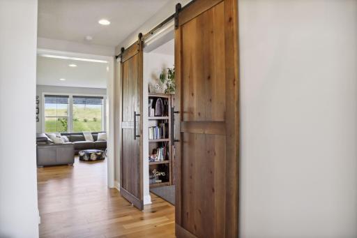 This custom barn door leads you into the oversized office