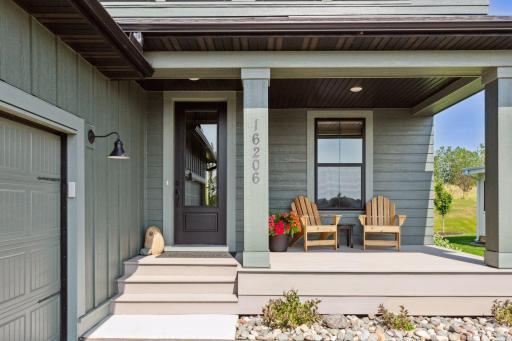 Enjoy beautiful sunset views from the front porch with upgraded Azek decking!