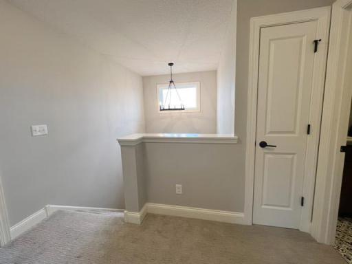 The laundry room is to the right of this picture. Large linen closet and showcasing how natural light fills the upstairs as well!
