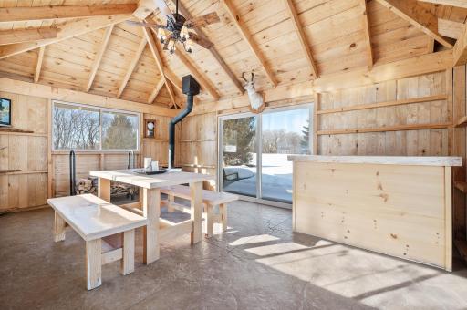 Interior of tiki hut also features wood-burning fireplace for cold-weather enjoyment
