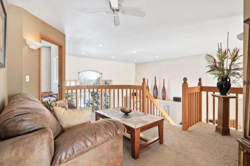 Upper level sitting area, could be a great space for a toy area or reading nook