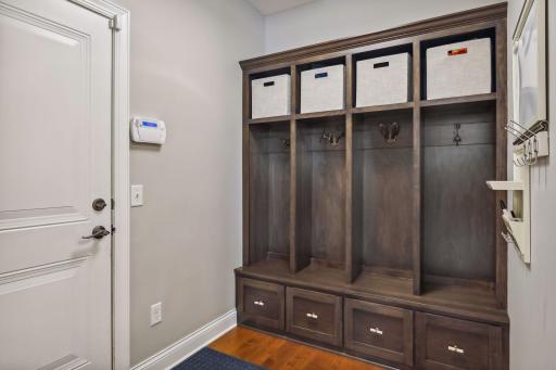 Large mudroom with built in cubbies and storage