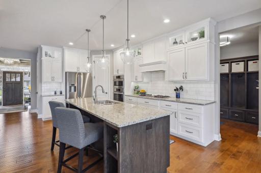 Huge center island creates the perfect area to entertain guests. Plenty of storage and a large walk in pantry