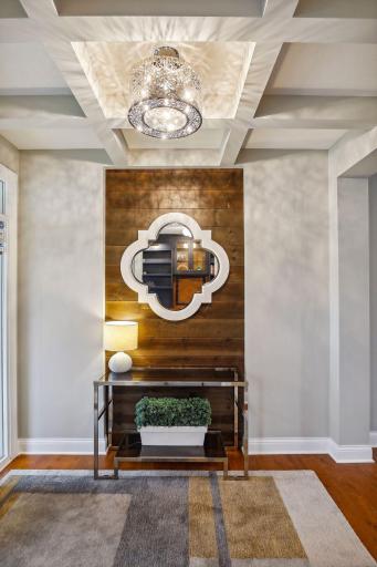 Entry accent wall creates a stunning backdrop