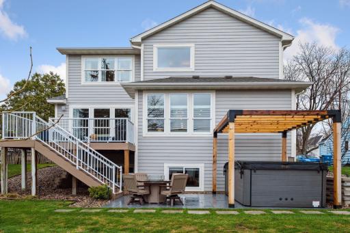 View from back of house with Fitness Swim Spa and custom pergola