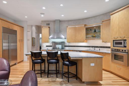 Thoughtfully designed to cater to your storage needs, the kitchen provides ample space, featuring numerous drawers, a well-appointed pantry, and an abundance of cabinets to house all your culinary essentials.