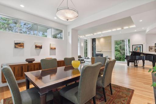 The spaciousness of this room easily accommodates a large dining table for eight, while a built-in credenza provides a perfect platform for displaying your most cherished pieces.