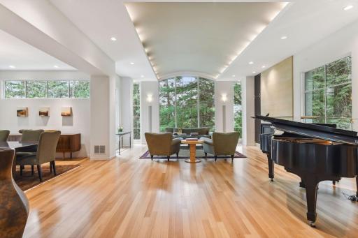 The ceiling, gracefully curved, bestows a touch of uniqueness and artistry to the design. This carefully crafted curvature serves a purpose beyond aesthetics, enhancing the acoustics of the room to perfection, making it an ideal venue for hosting.