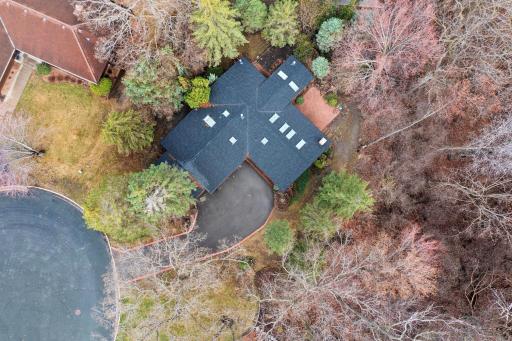The cul de sac is ideal for kids learning to roller-skate, ride a bike and pickup ball games with the neighbors. home is nestled amongst towering trees and lush greenery.