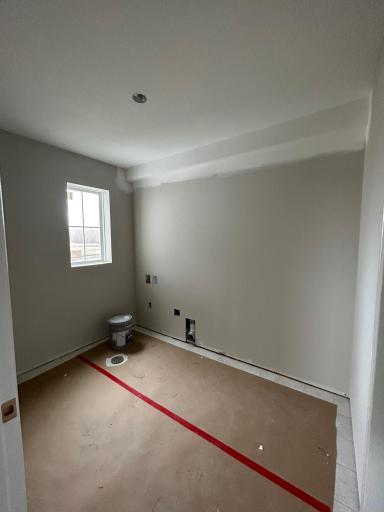 Laundry Room, Photo Taken of Actual Home.