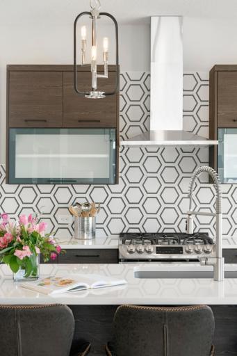 Urban inspired interiors with gourmet kitchens and luxury features. Photo is of model home; options and features will vary.