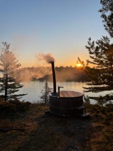 A Wood Fired Hot Tub is the perfect spot to capture the sunset views.