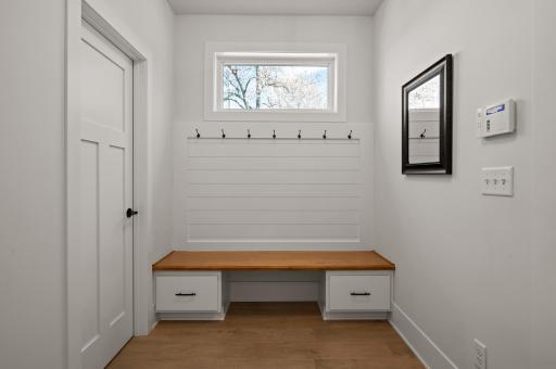 Mudroom and large closet conveniently located off the garage entrance