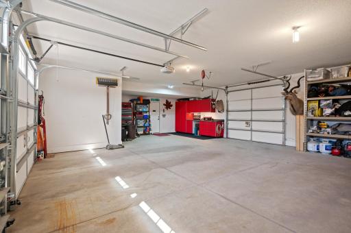 Garage fits up to 4 vehicles and has a back garage door for easy access to the yard and lake.
