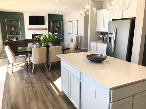 Grand center island for entertaining your guest and those large gatherings. Finishes will vary.