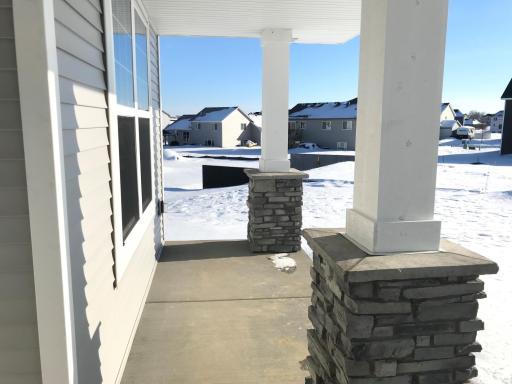 Front porch will be a great place to enjoy those summer days! Finishes will vary.